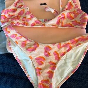 triangl swimwear light pink bikini with bright Pink & Orange Leopard Spots.
